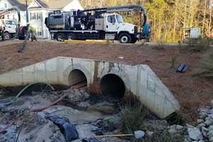Vac•Con Recycler -Working in a residential location over culvert