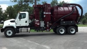 Industrial Vacuum Trucks - sitting in parking lot side view